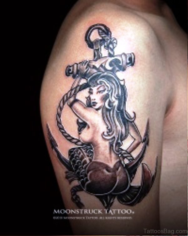 Grey Inked Mermaid With Anchor Tattoo
