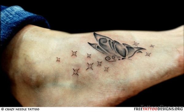 Lovely Butterfly And Star Feet Tattoo