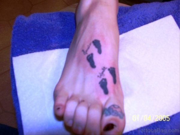 Mind Blowing Baby Footprints Tattoo