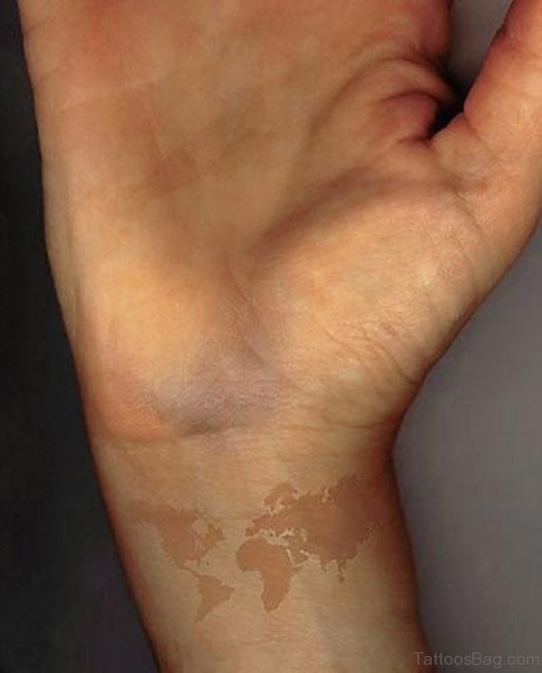 Nice Brown Tattoo On Wrist