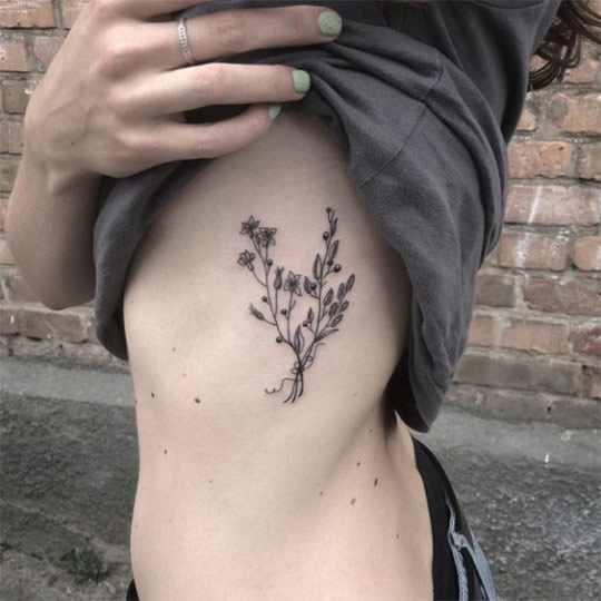 Small Floral Rib Tattoo
