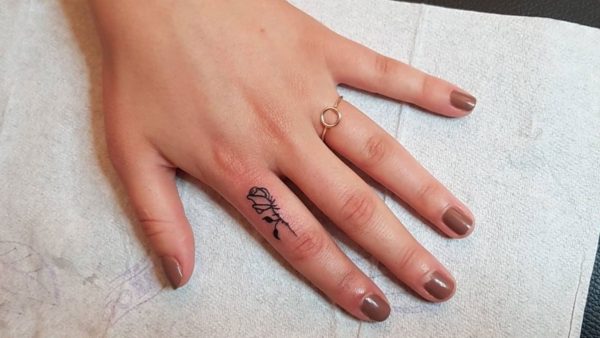 Minimalist Finger Tattoo