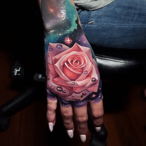 Pink Rose Hand Tattoo