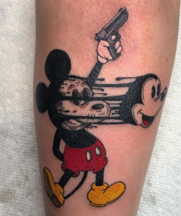 Mickey Mouse Holding A Gun Tattoo