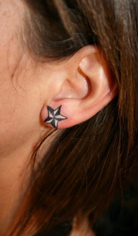 Little Star On The Ear Tattoo