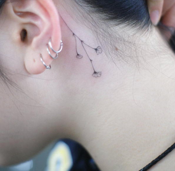 Flowers Behind Ear Tattoo