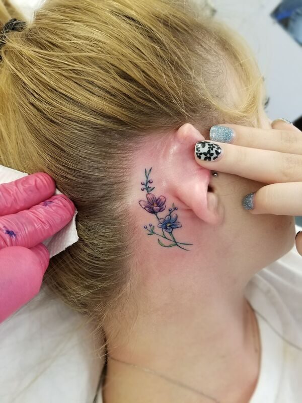 Flowers Behind Ear Tattoo