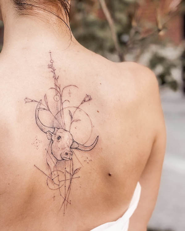 Intricate Spine Tattoo For Taurus