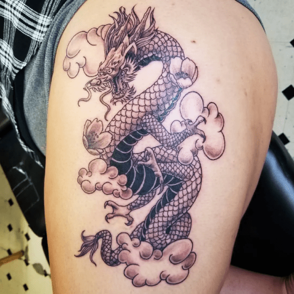 Female Dragon Tattoo On Thigh