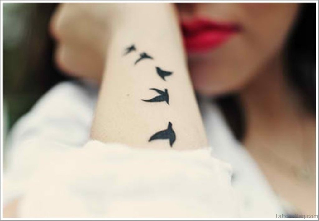 black doves flying tattoo