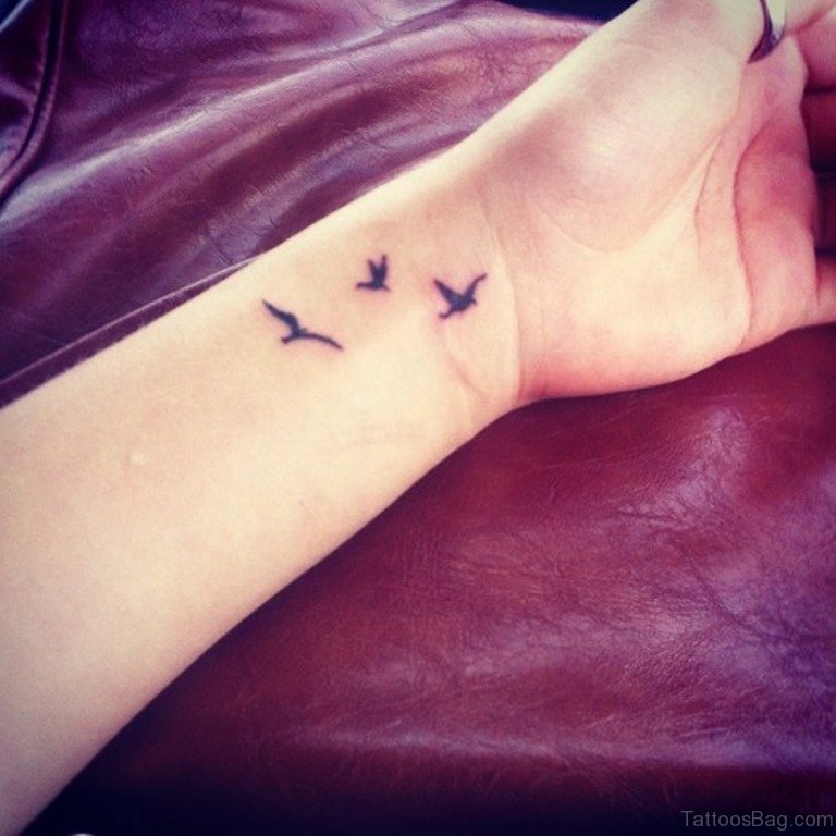 56 Charming Birds Tattoos For Wrist