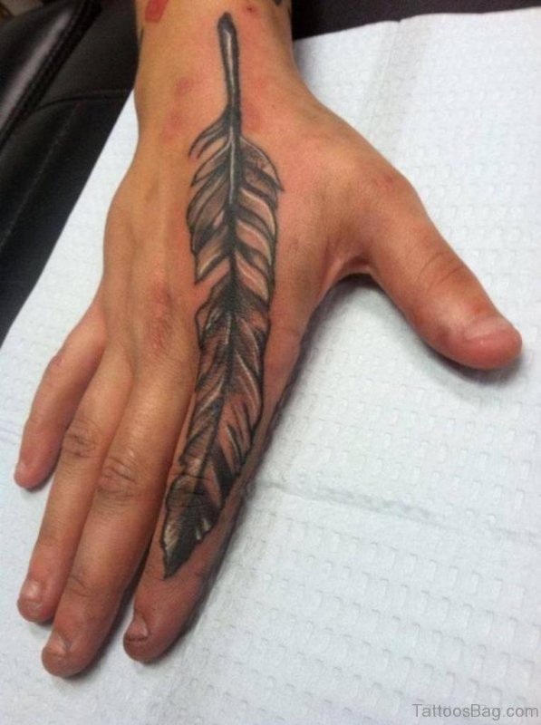 28 Subtle Feather Tattoos On Finger