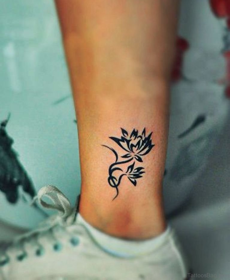 Fine line ornamental lotus flower tattoo on the ankle