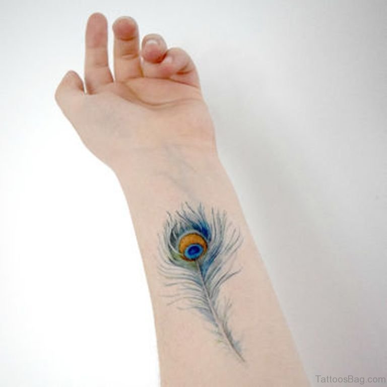 31 Awesome Peacock Feather Tattoos On Wrist