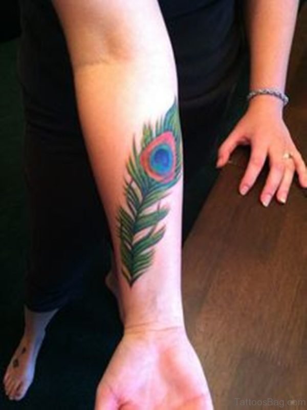 31 Awesome Peacock Feather Tattoos On Wrist - Tattoo Designs ...