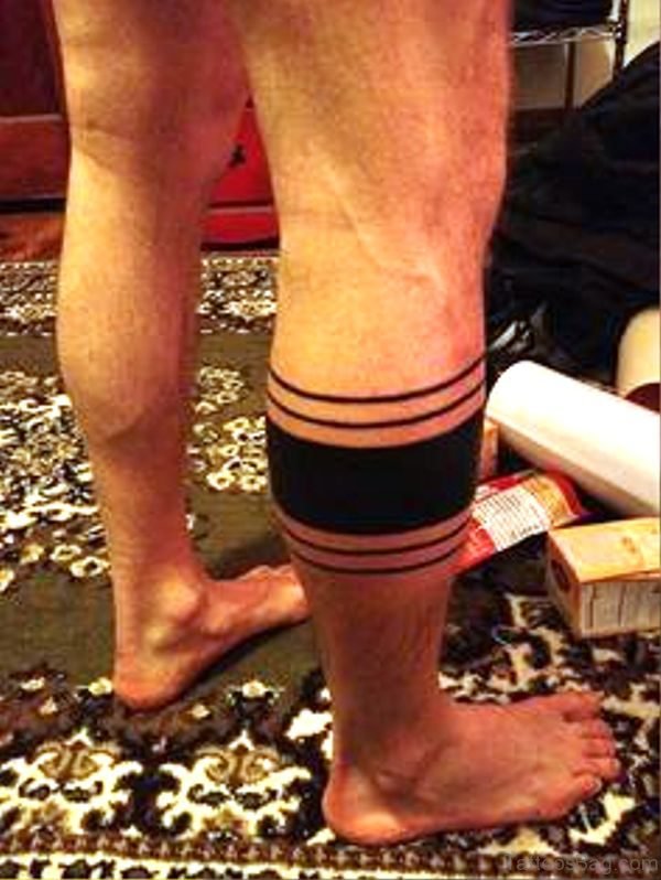 solid band tattoo leg