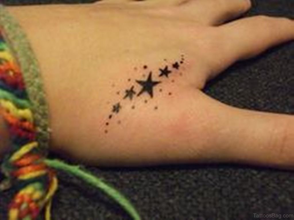 star tattoos on fingers